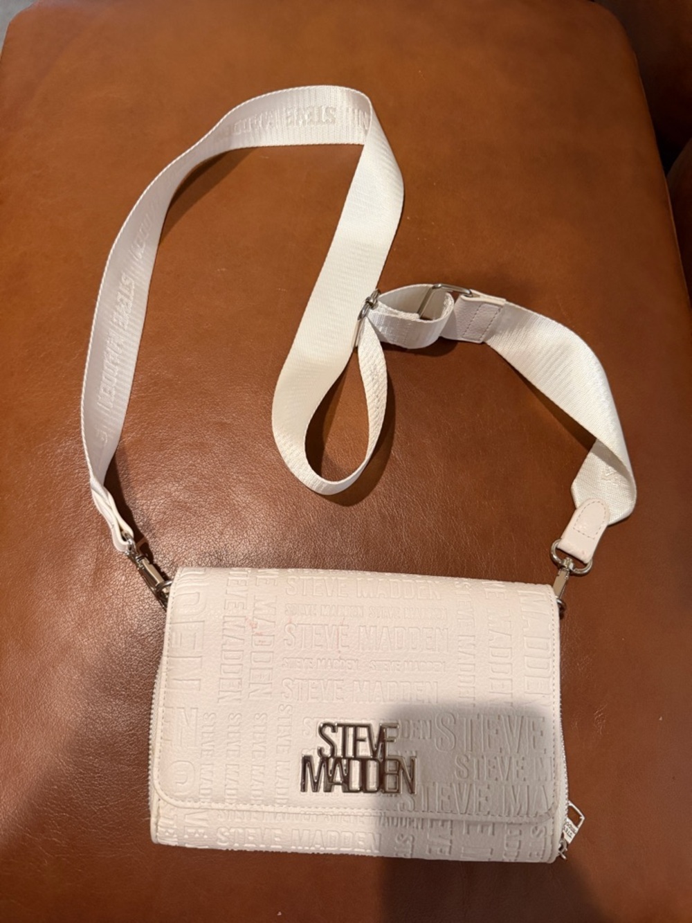 Steve Madden White Wide Logo-Embossed Crossbody Strap with Silver Hardware
